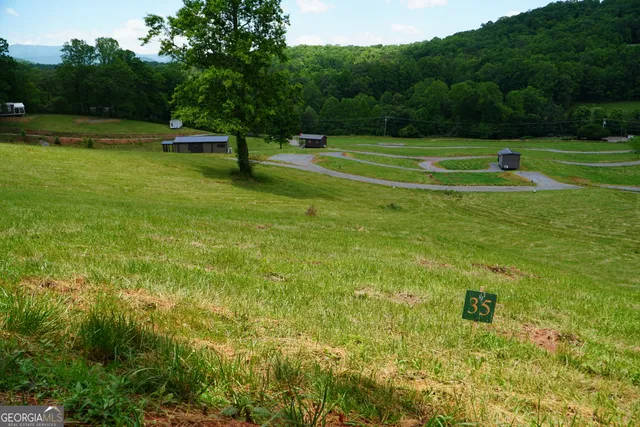 a view of a golf course with a park