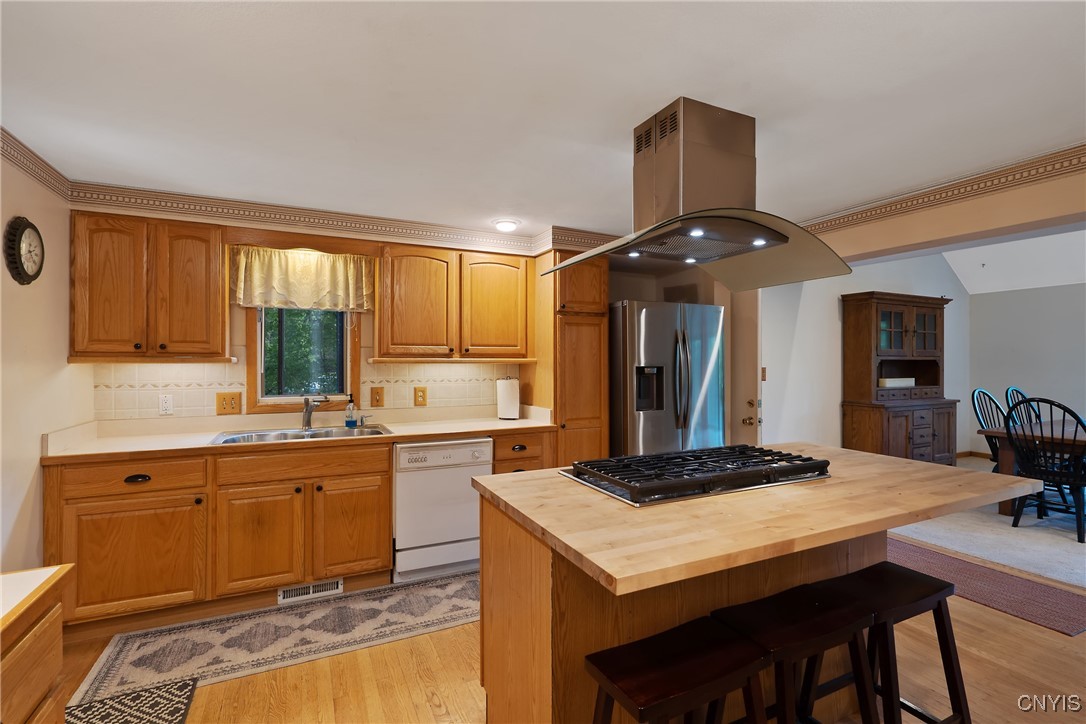 8734 Radburn Drive Lysander, NY 13027 - Photo 15 of 40 plenty of cupboard space, double sink and disposal