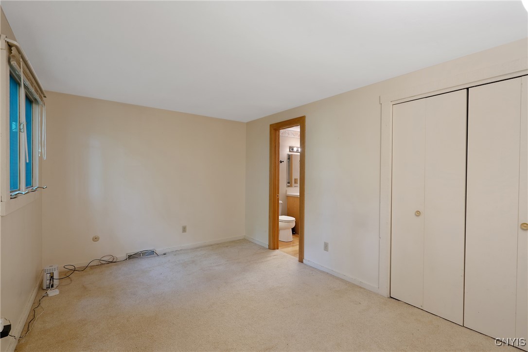 8734 Radburn Drive Lysander, NY 13027 - Photo 19 of 40 First floor BR has carpeting , private entry into