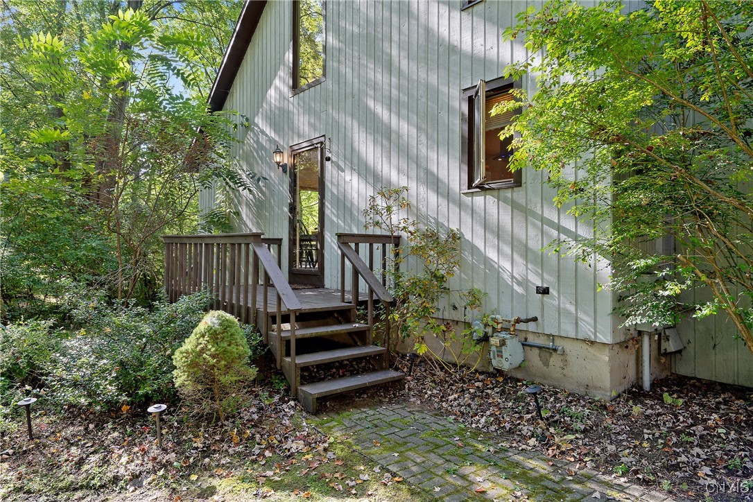 8734 Radburn Drive Lysander, NY 13027 - Photo 2 of 40 Side "FRONT" entry welcomes you into the open floo