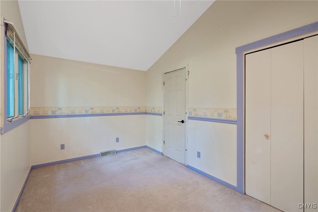 8734 Radburn Drive Lysander, NY 13027 - Photo 22 of 40 Upper level BR has carpeting, large closet and dou