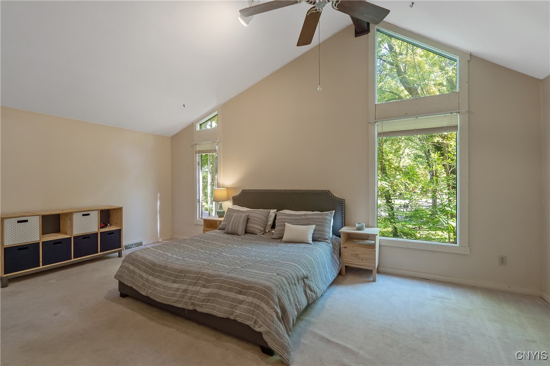 8734 Radburn Drive Lysander, NY 13027 - Photo 26 of 40 Beautiful cathedral ceilings in the Primary BR wit