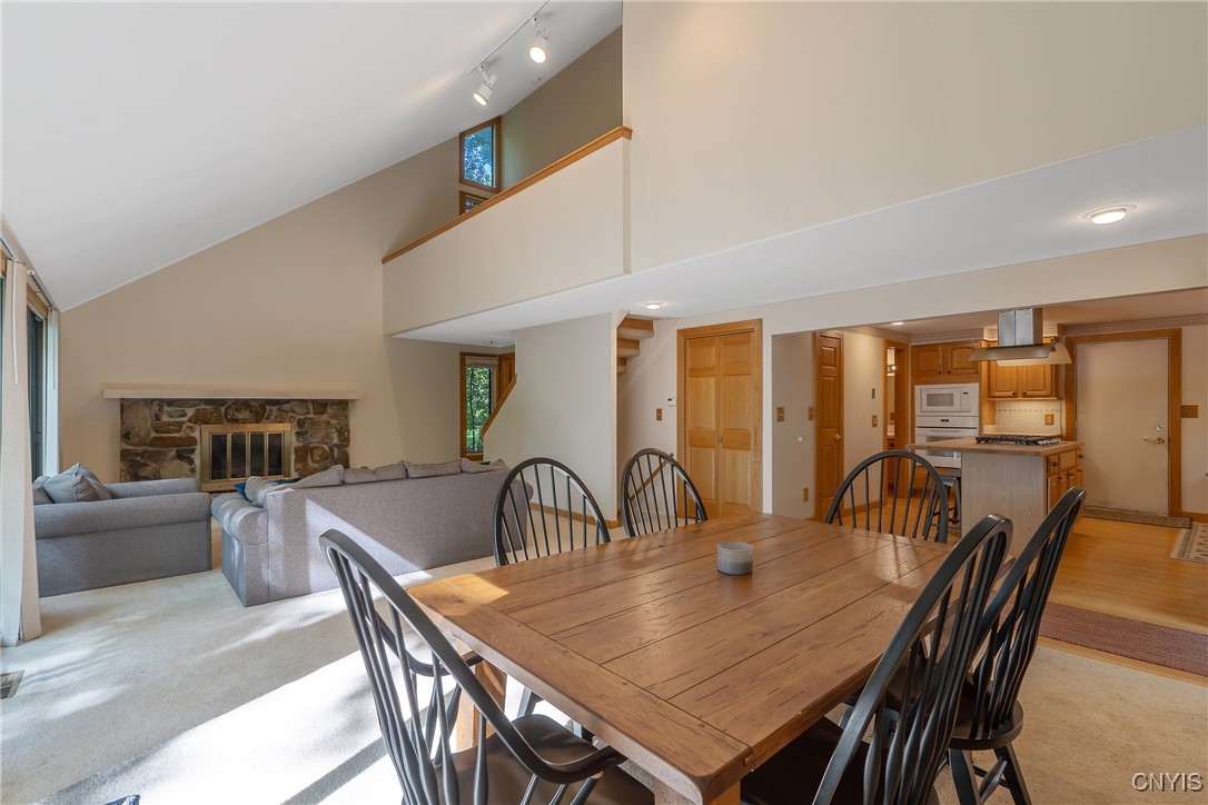 8734 Radburn Drive Lysander, NY 13027 - Photo 3 of 40 DR and LR are open to the kitchen area which makes