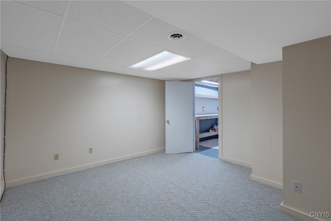 8734 Radburn Drive Lysander, NY 13027 - Photo 33 of 40 Bonus room in the lower level can serve as an offi