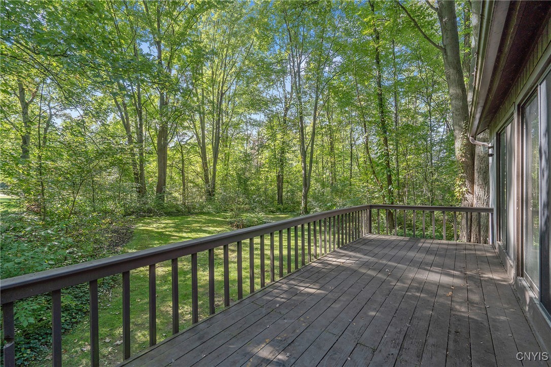 8734 Radburn Drive Lysander, NY 13027 - Photo 36 of 40 Back deck over looks private yard...
