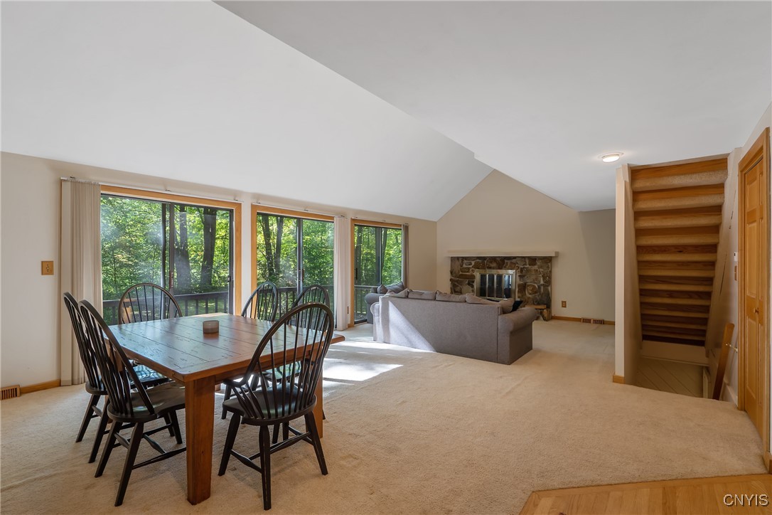 8734 Radburn Drive Lysander, NY 13027 - Photo 4 of 40 Loads of natural lighting from the three large sli