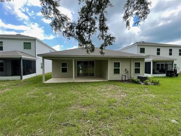 front view of a house with a garden