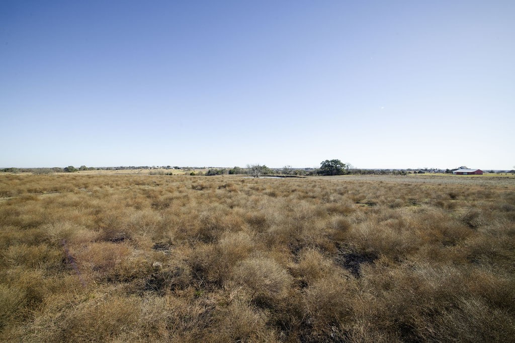 Tbd Mockingbird Road Brenham, TX 77833 - Photo 7 of 10 a view of a large mountain with trees in the background