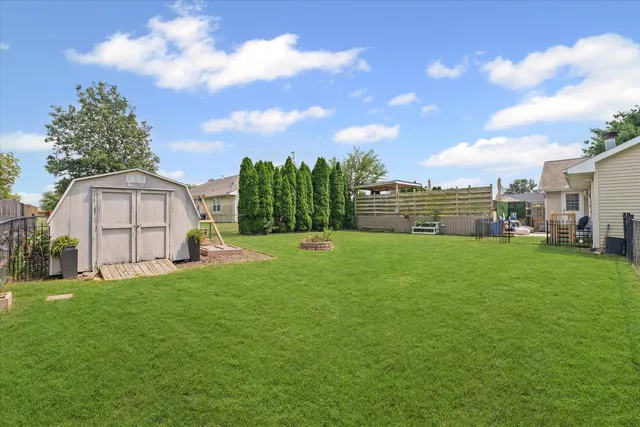 a outdoor space with a couch and chairs