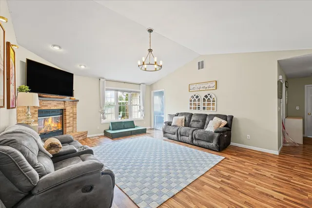 a living room with furniture or couch and a flat screen tv