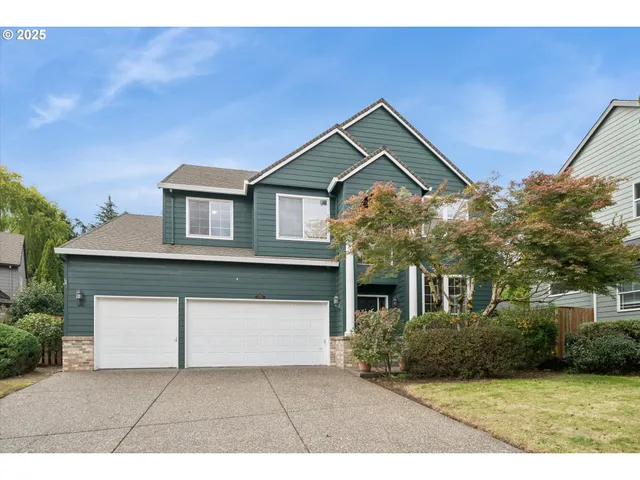 a house view with a garden space