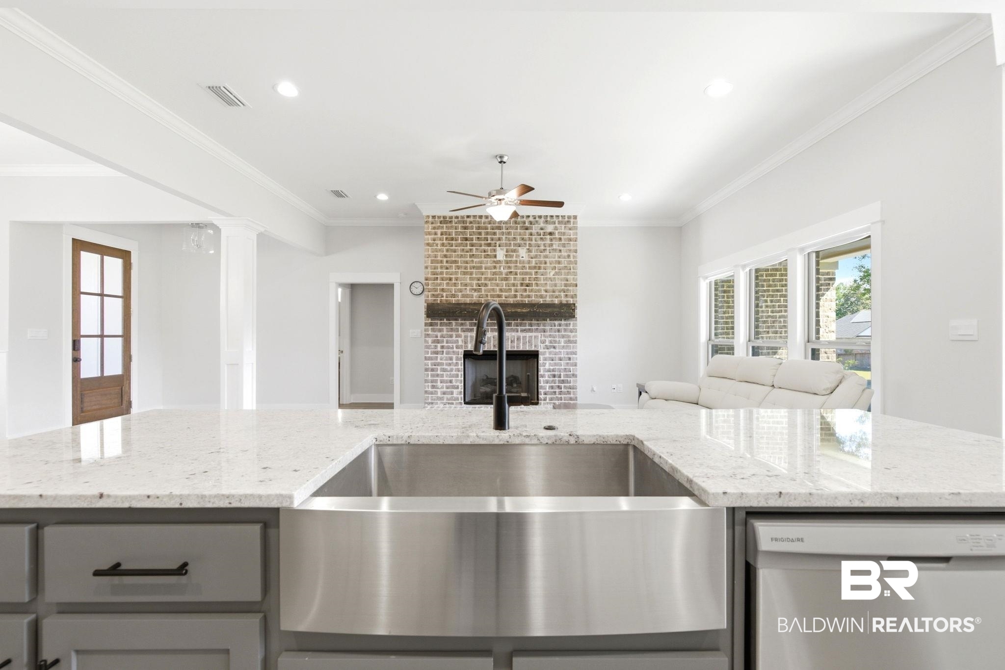 12132 Exbury Way Daphne, AL 36527 - Photo 47 of 47 Kitchen featuring open floor plan, light stone counters, stainless steel dishwasher, a ceiling fan, and gray cabinets