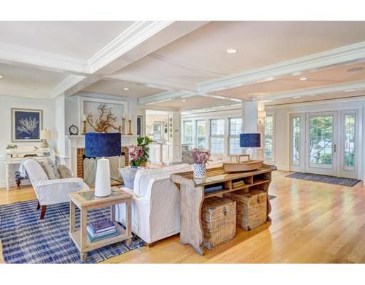 646 South Orleans Road Orleans, MA 02653 - Photo 12 of 42 a living room with furniture a wooden floor and a large window