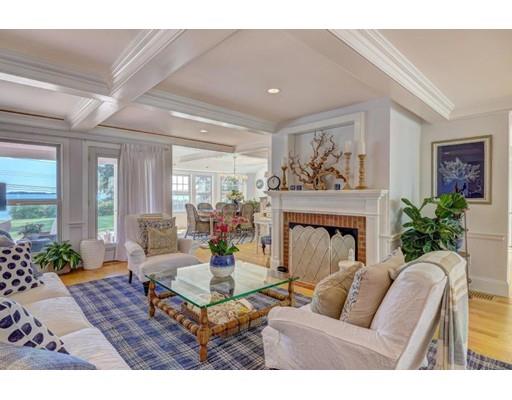 646 South Orleans Road Orleans, MA 02653 - Photo 13 of 42 a living room with furniture and a fireplace