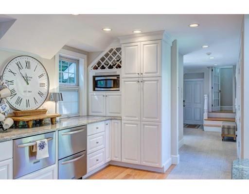 646 South Orleans Road Orleans, MA 02653 - Photo 18 of 42 a kitchen with stainless steel appliances granite countertop a stove and a refrigerator