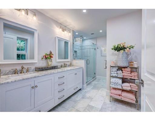 646 South Orleans Road Orleans, MA 02653 - Photo 23 of 42 a spacious bathroom with a granite countertop sink a mirror and a