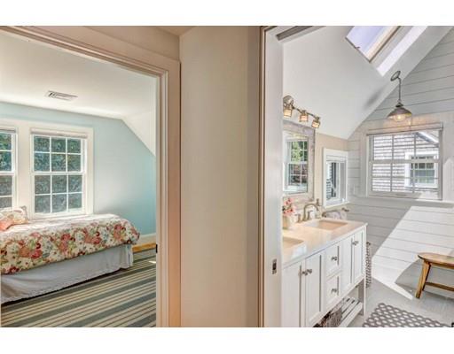 646 South Orleans Road Orleans, MA 02653 - Photo 31 of 42 a en suite bathroom with a sink mirror and a bath tub