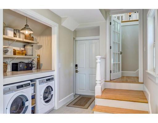 646 South Orleans Road Orleans, MA 02653 - Photo 33 of 42 a view of washer and dryer with kitchen in the background