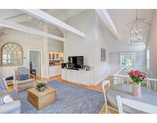 646 South Orleans Road Orleans, MA 02653 - Photo 34 of 42 a living room with furniture and a flat screen tv