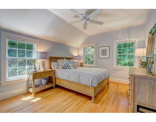 646 South Orleans Road Orleans, MA 02653 - Photo 38 of 42 a bedroom with a bed and a large window