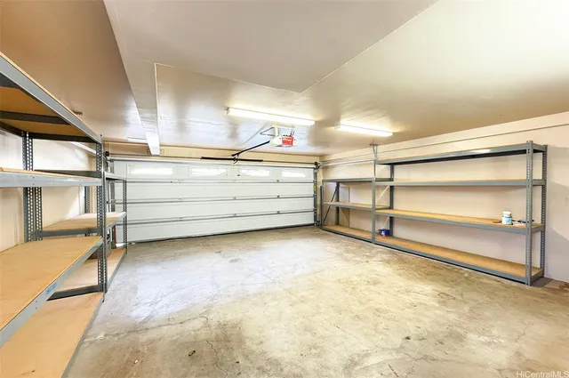 a view of room with racks on the wall