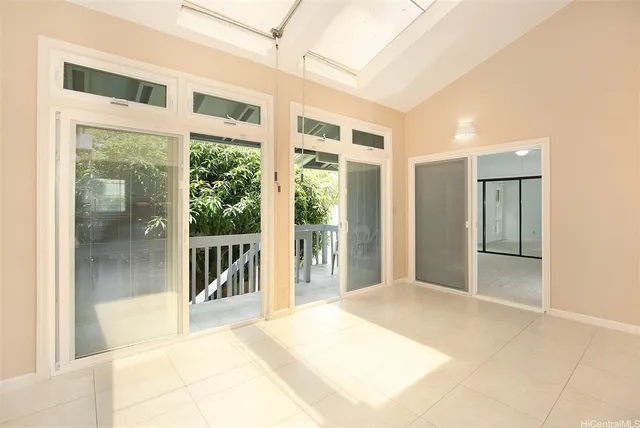 a view of a room with a large window