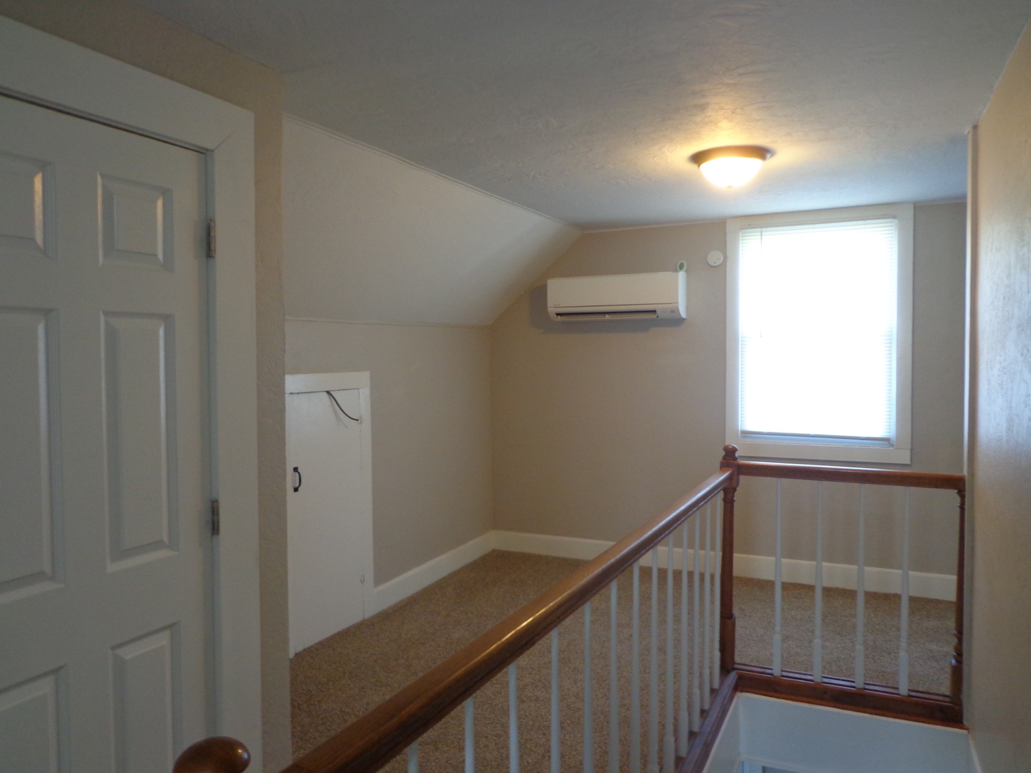 181 Washington Avenue Camden, TN 38320 - Photo 50 of 68 a view of entryway with a window and wooden floor