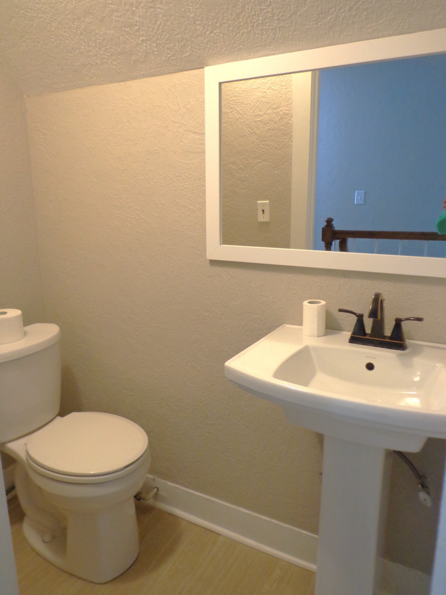 181 Washington Avenue Camden, TN 38320 - Photo 52 of 68 a bathroom with a sink a toilet and mirror