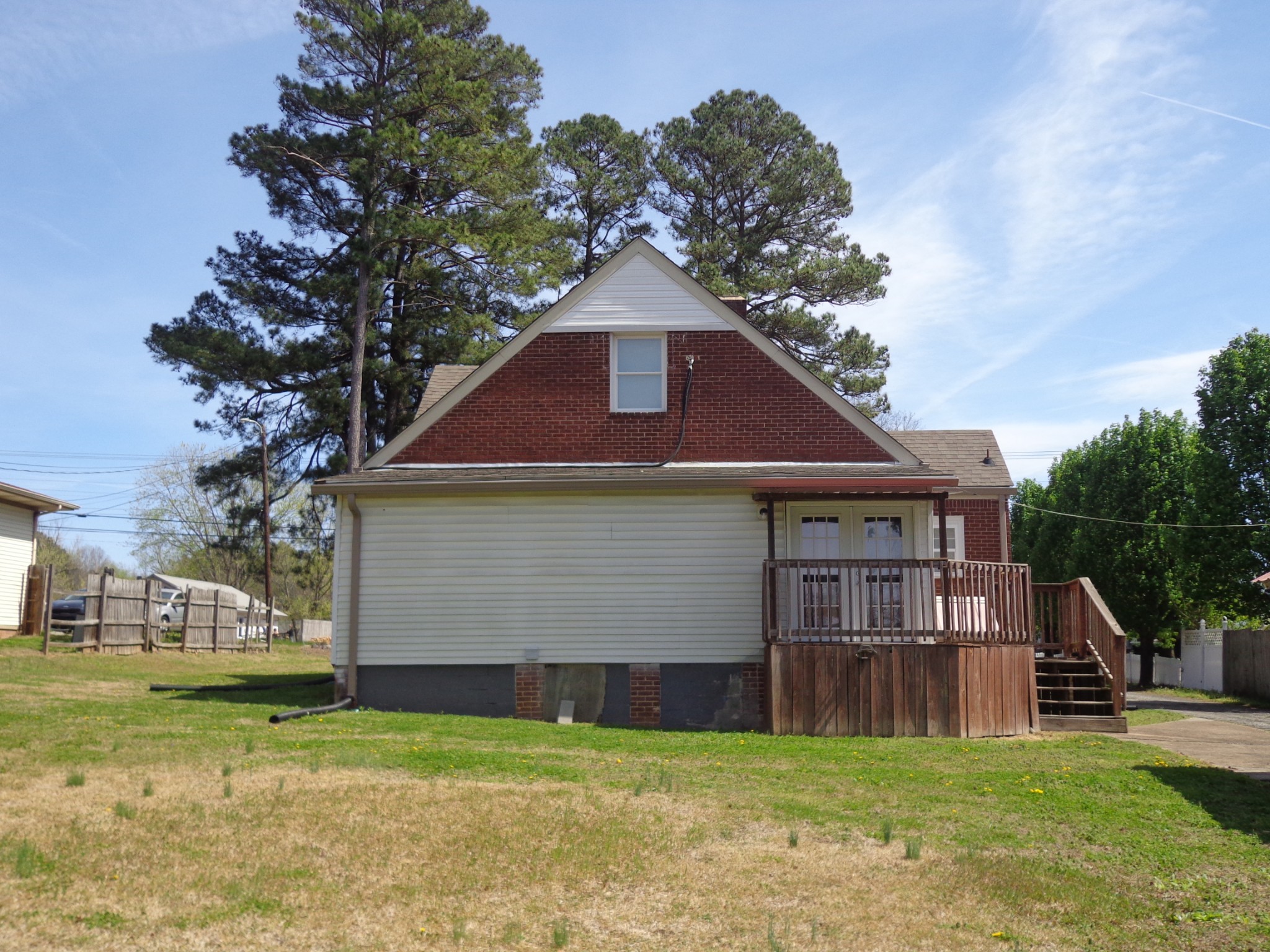 181 Washington Avenue Camden, TN 38320 - Photo 58 of 68 a view of a yard in front of a house with large trees