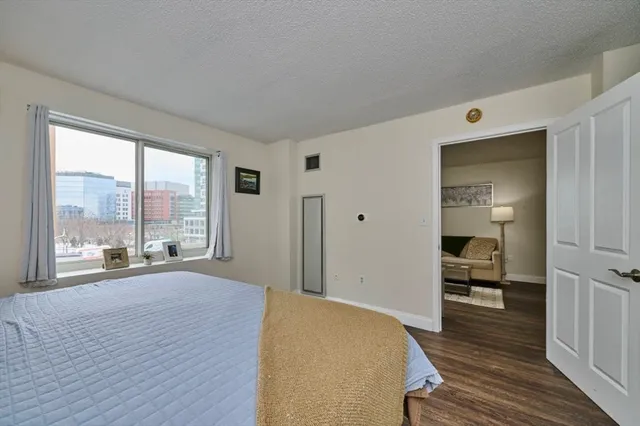 a bathroom with a sink a mirror and a shower