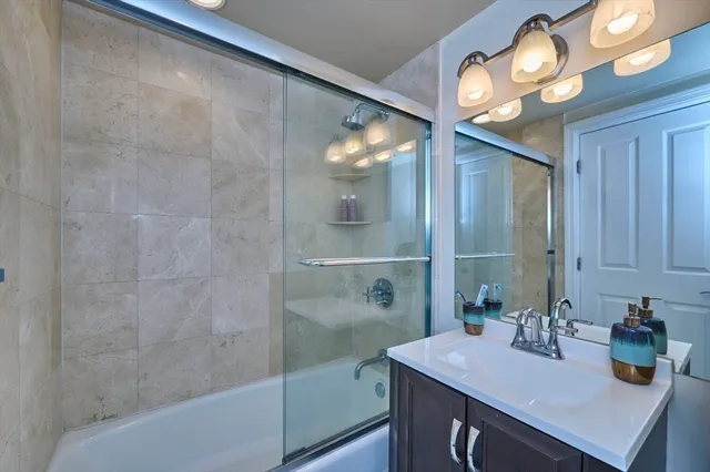 a utility room with sink dryer and washer