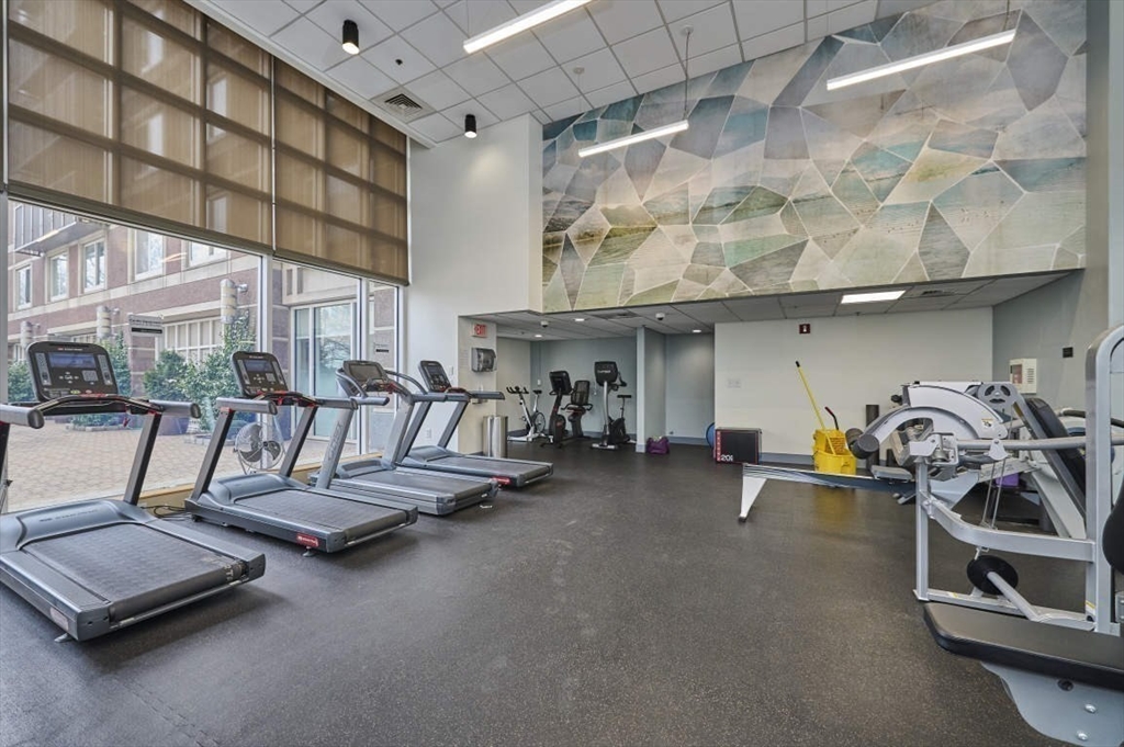 10 Museum Way, Unit 525 Cambridge, MA 02141 - Photo 19 of 22 a view of a room with gym equipment