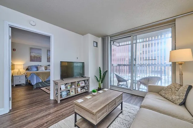 an view of a kitchen counter space a sink and cabinets