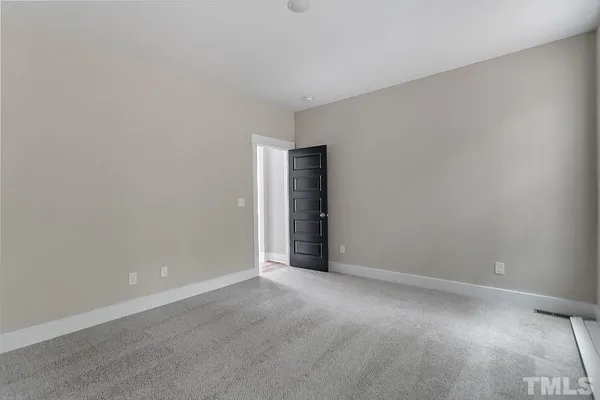 an empty room with an entryway