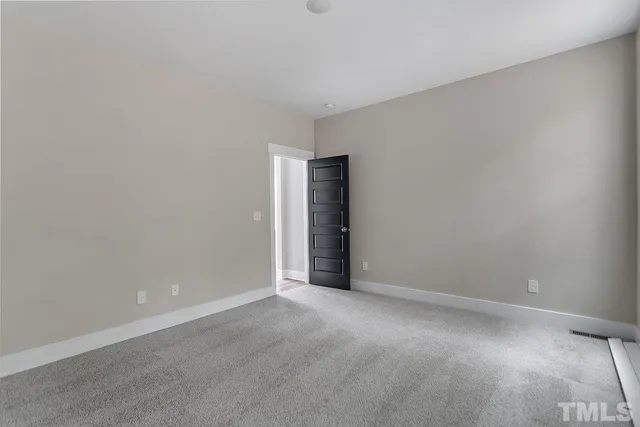 an empty room with an entryway