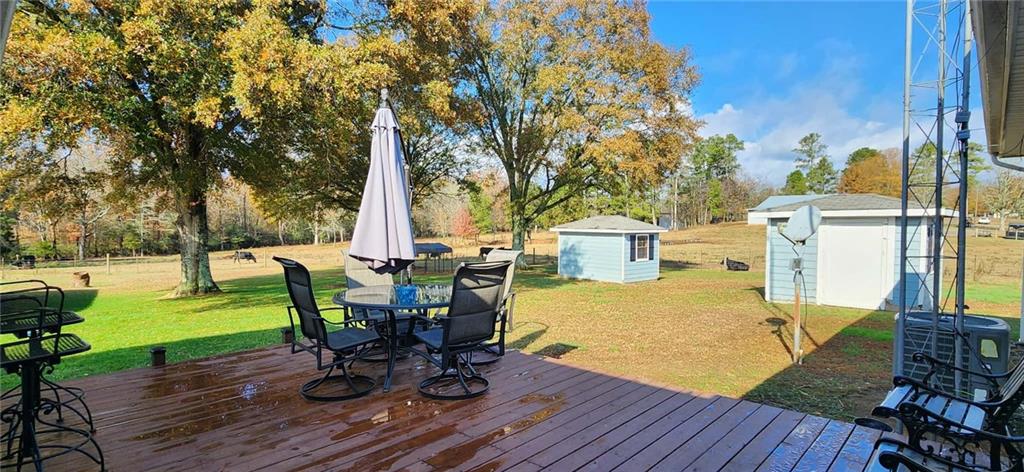 246 Defoor Road Resaca, GA 30735 - Photo 14 of 35 a view of a backyard with sitting area