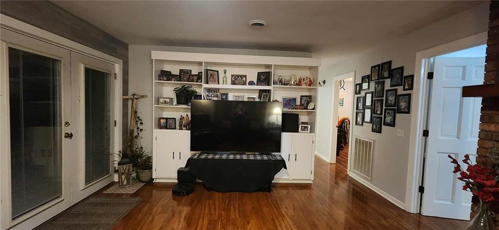 246 Defoor Road Resaca, GA 30735 - Photo 23 of 35 a living room with furniture and a wooden floor