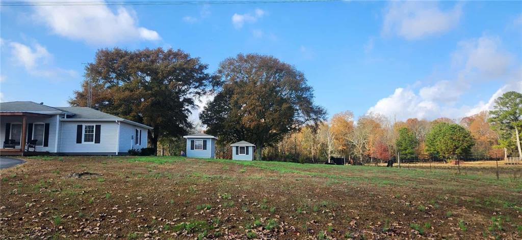246 Defoor Road Resaca, GA 30735 - Photo 5 of 35 a view of a house with a yard