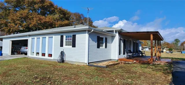 a front view of a house with yard