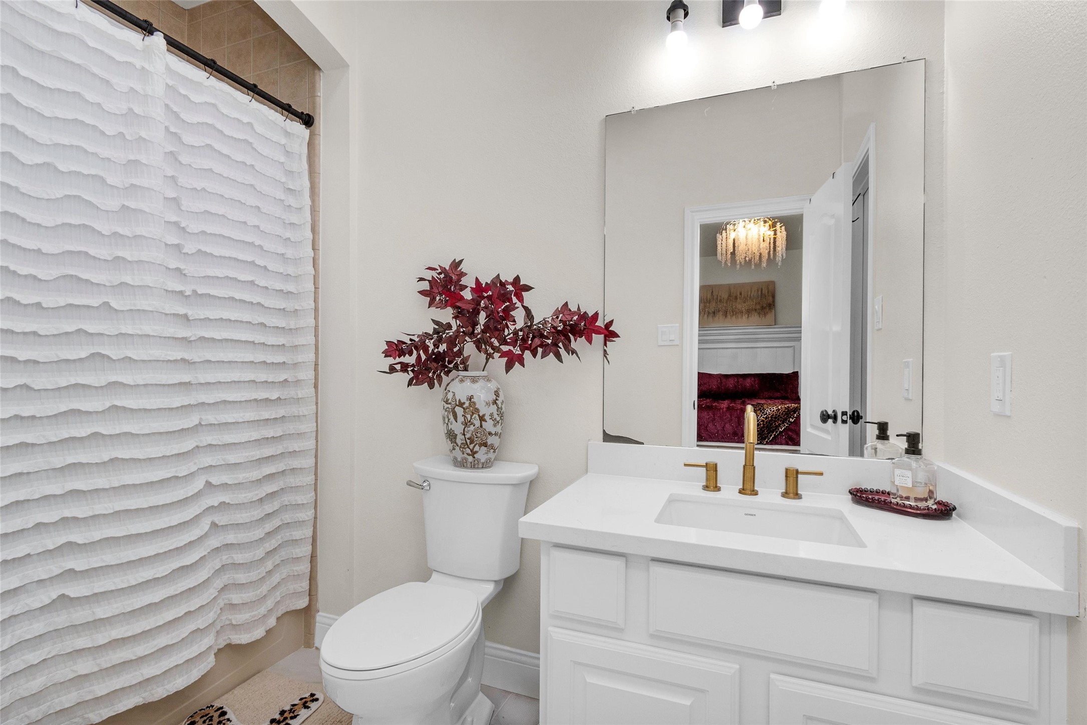 10004 Summer Ridge Lane Conroe, TX 77302 - Photo 36 of 50 a bathroom with a sink toilet and shower