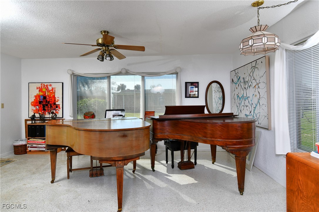 2212 East 6th Street Lehigh Acres, FL 33936 - Photo 15 of 34 a view of a dining room with furniture