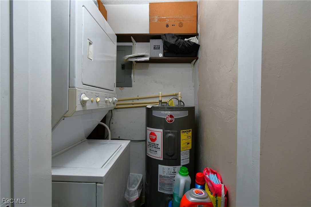 2212 East 6th Street Lehigh Acres, FL 33936 - Photo 19 of 34 a utility room with dryer and washer