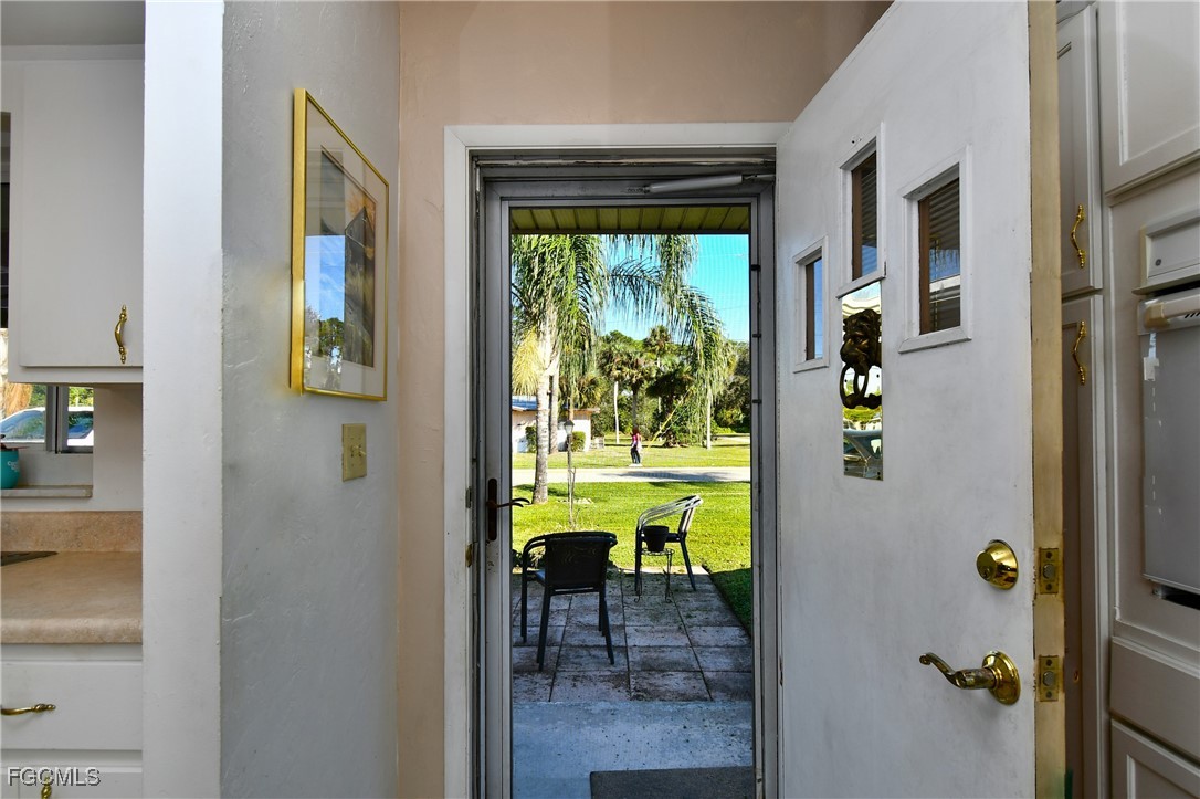 2212 East 6th Street Lehigh Acres, FL 33936 - Photo 7 of 34 a dining room with a window