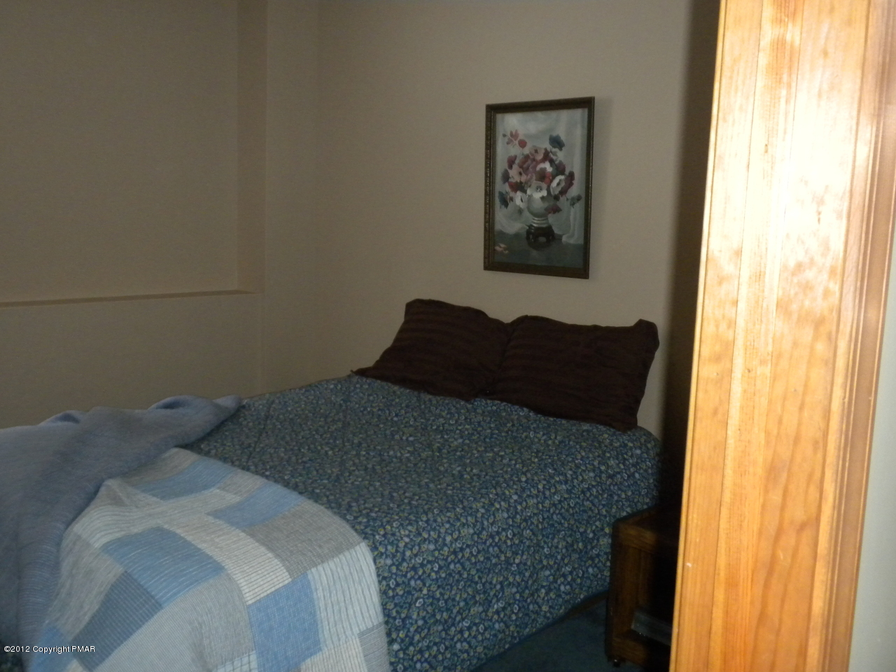 38 Hill Road Effort, PA 18330 - Photo 12 of 13 a bedroom with a bed and a window