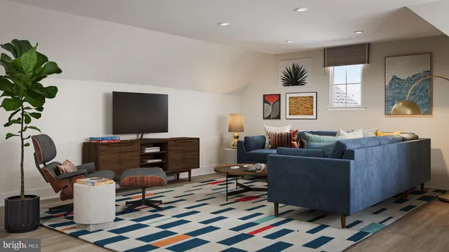 a bedroom with a large bed and a large window