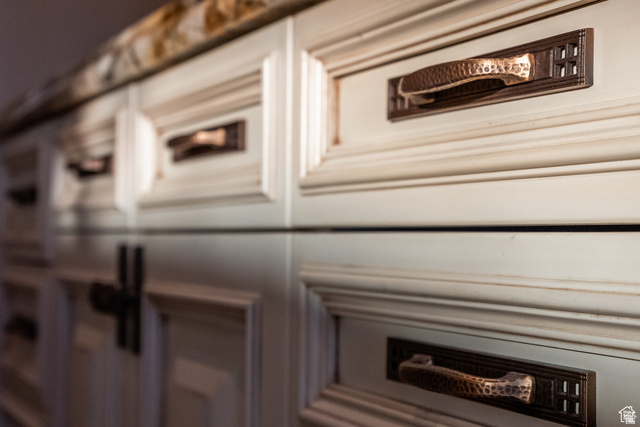 694 West Cephus Road Draper, UT 84020 - Photo 31 of 148 Custom cabinetry featuring a distressed white finish and paneled doors