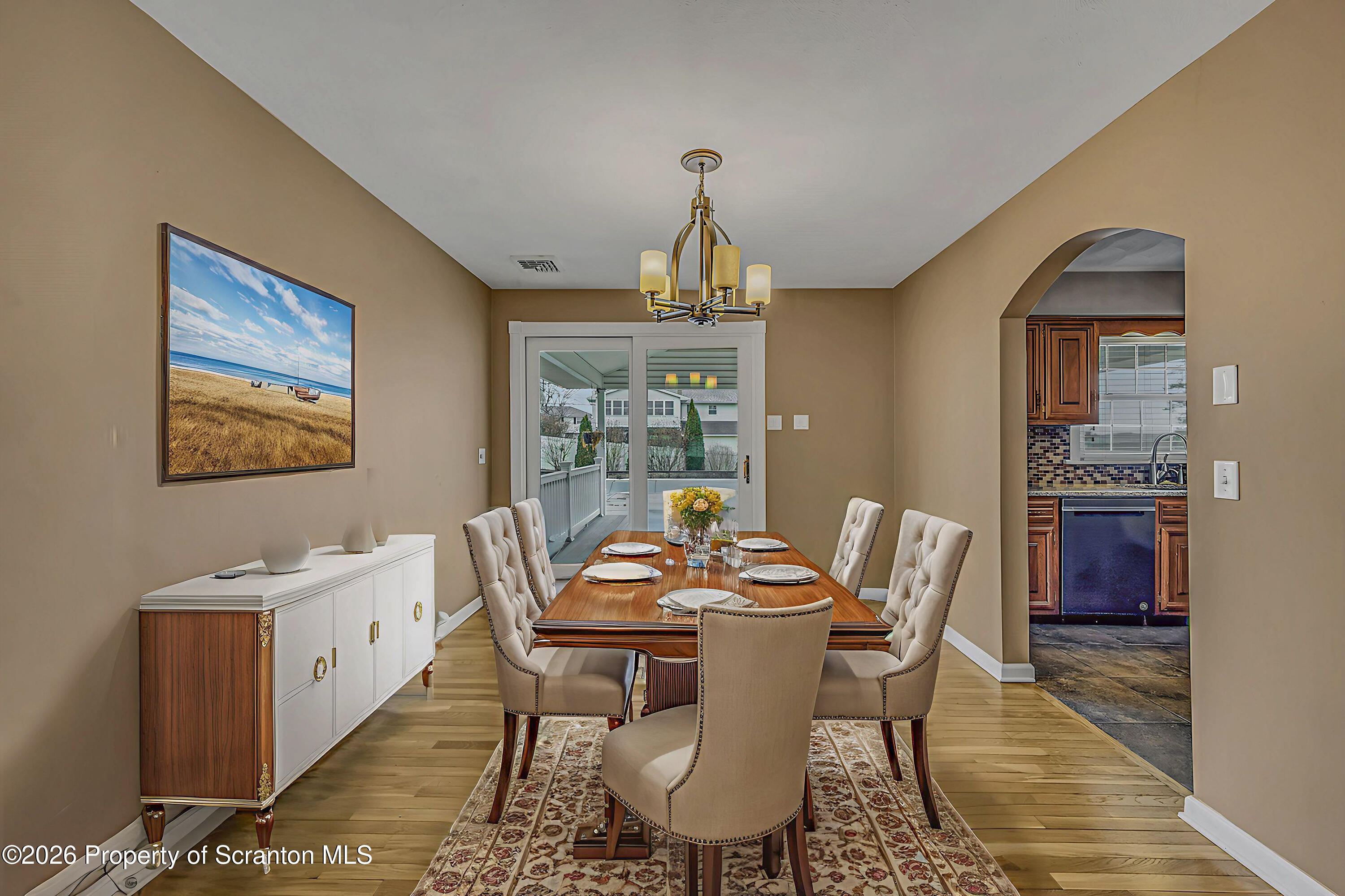 804 School Street Moosic, PA 18507 - Photo 25 of 67 a dining room with furniture a chandelier and wooden floor