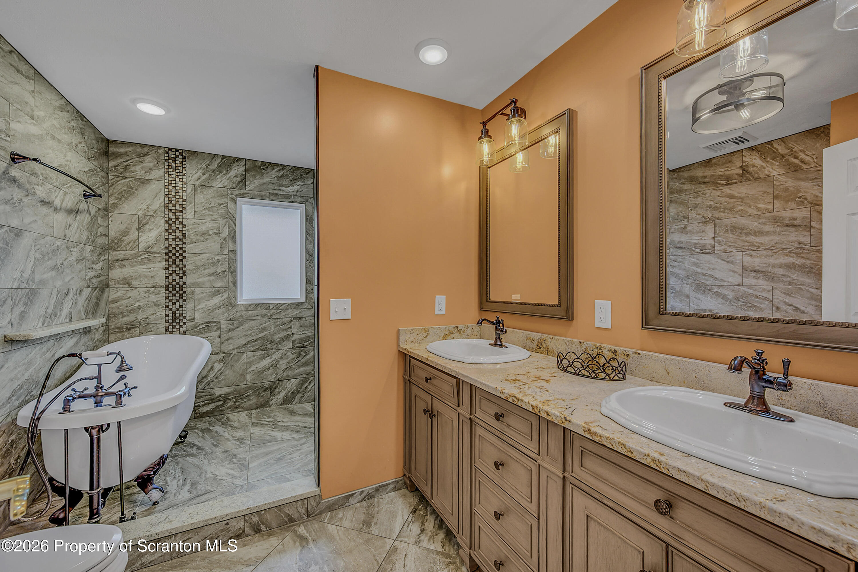 804 School Street Moosic, PA 18507 - Photo 32 of 67 a bathroom with a double vanity sink mirror and shower