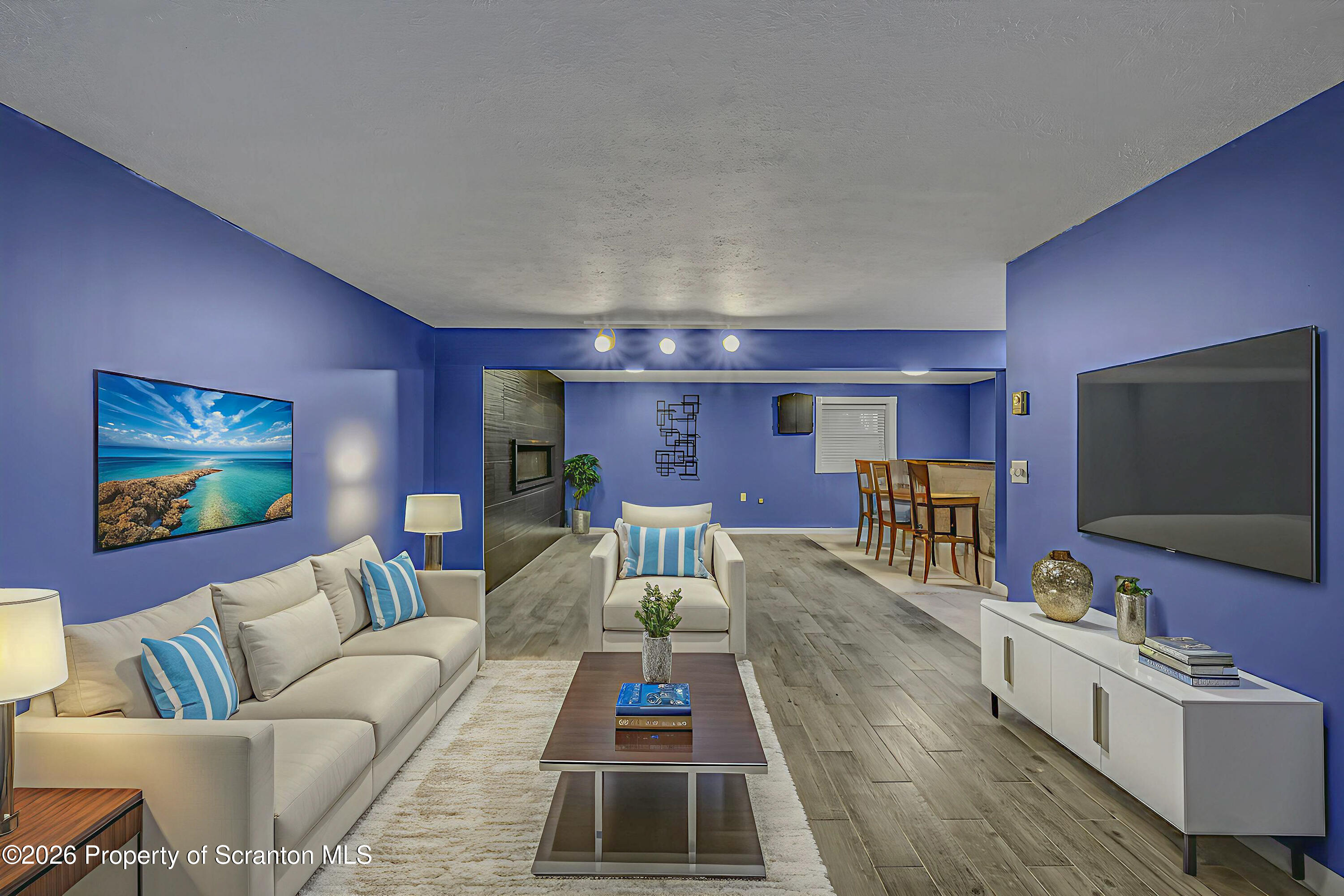 804 School Street Moosic, PA 18507 - Photo 45 of 67 a living room with furniture and a flat screen tv