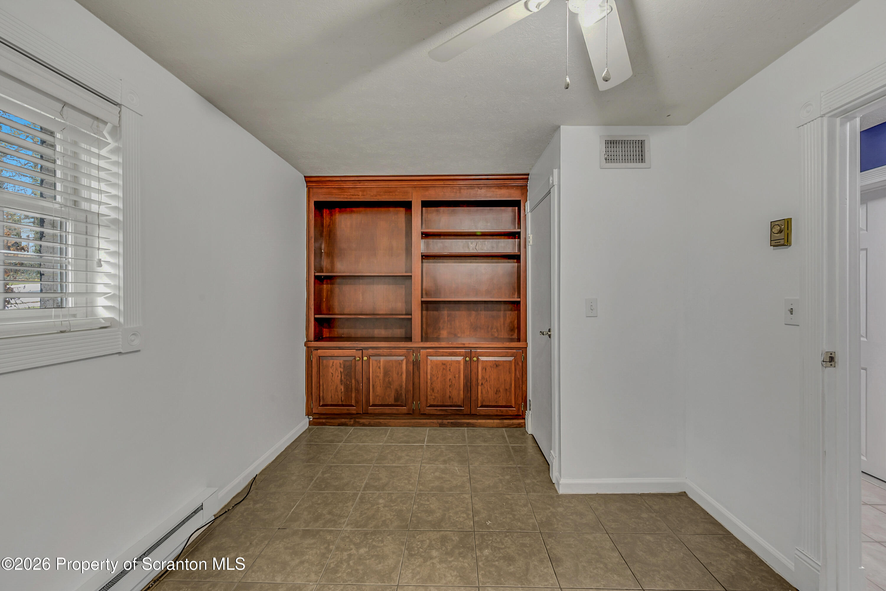 804 School Street Moosic, PA 18507 - Photo 49 of 67 a view of walk in closet with empty racks
